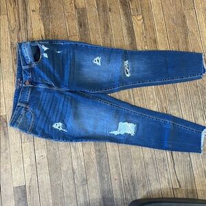 Maurices Mid-Rise Jeans in Blue with Brown Stitching